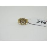 A 9ct Gold Ring, of abstract openwork design (finger size J1/2).