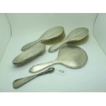 A Hallmarked Silver Backed Four Piece Dressing Table Set, (bristle damage/loss) together with a