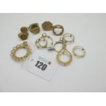 9ct Gold Coin Pendant Mounts, (no coins), a 9ct gold ring mount, 9ct gold facsimile coin rings etc.