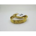 A High Carat Wide Indian Bangle, with engraved decoration; Together with Another Bangle. (2)