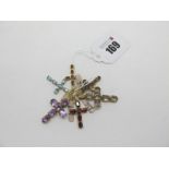 Six 9ct Gold Cross Pendants, oval claw and collet set. (6)