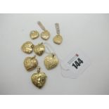 Eight Modern 9ct Gold and "375" Heart Shape Locket Pendants. (8)
