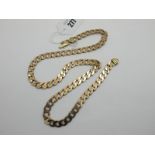 A Large 9ct Gold Flat Curb Link Chain, (clasp damaged / incomplete), 62cm long (excluding clasp).