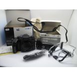 Minolta Dynax 7 Camera, 35mm and instruction manual, boxed, plus Minolta camera guard, boxed. (2)