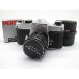 Pentax Spotmatic SP, with Takumar 1.3 lens, lens holder with round lens hood cover.