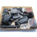 Quantity of Camera Accessories, cases, lenses, lens covers, tripod and a Vivitar Tele Converter,