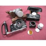 Canon No. 22574, in camera holder, Canon No. 22547, in leather case, Canon Lens 135mm No. 61108,