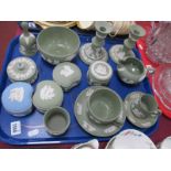 Wedgwood Green Jasper Ware Pottery, of approximately twelve pieces, including candlestick, cups
