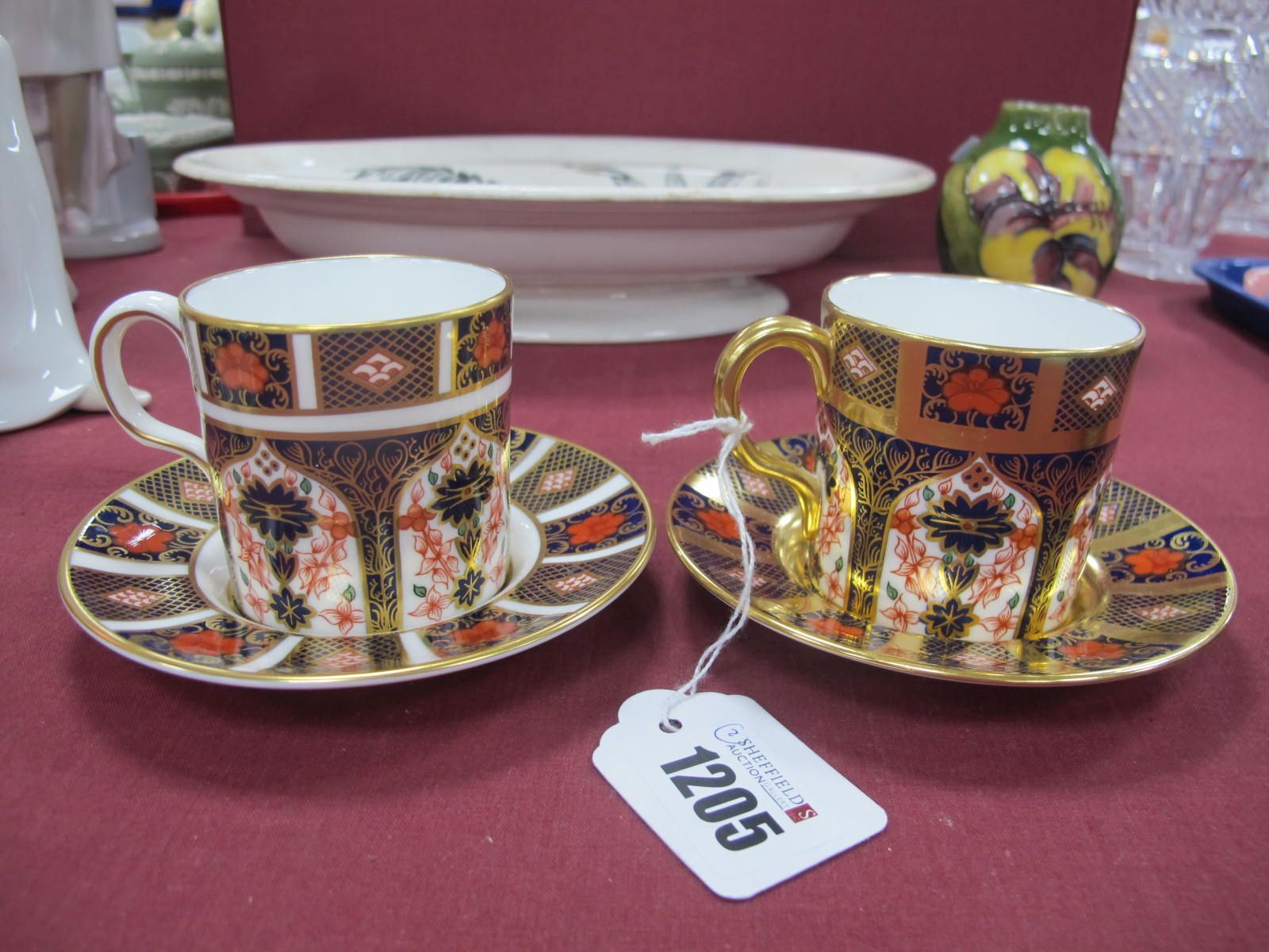 Royal Crown Derby 1128 Imari, two coffee cups and two saucers, second quality.