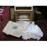 Tablecloths, tea cloths, mats, serviettes, etc, picture frames, leather case.