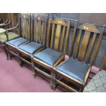 A Set of 1920's Oak Dining Chairs, shaped top rail, drop in seats, on bobbin and block supports,