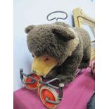 Ride On Children's Bear, with grip handles, on four wheels, approximately 58cm long.
