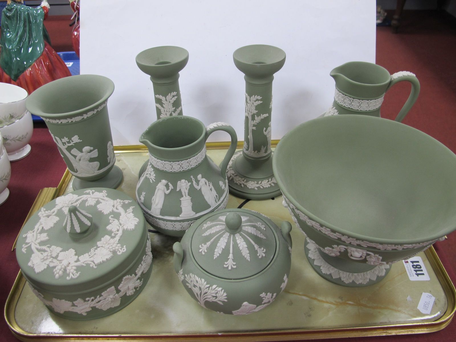 Wedgwood Green Jasper Ware Pottery, of eight pieces including pair of candlesticks, 17cm high, jugs,