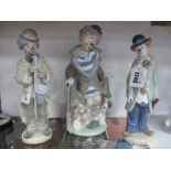 Lladro Clown with Dogs 5901, 24.5cm high, two clown musicians. (3)