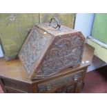 Early XX Century Mahogany Coal Shuttle, heavily foliate carved to top, front and sides, 36cm wide.