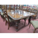 William IV Mahogany Wind Out Dining Table Top, with a moulded edge, on reeded turned legs, 148cm.