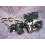 Praktica LTL Camera, having Helios-44-2 lens, Chinon CM-4S camera having 1:17 lens (2)