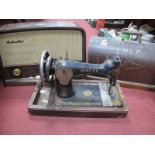 HMV Radio,Model 1372, a Singer sewing machine. (2)