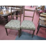 A Set of Six Early XX Century Oak Dining Chairs, with a reeded top rail, upholstered seat, on turned