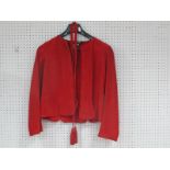 A Vintage Jean Muir Red Suede Jacket, of fitted collarless design with cut-out details and fringed