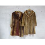 A Ladies Knee Length Beige Mink Coat, with rever collar and hook fastening; a 'Royal Castor'