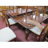 A XIX Century Style Mahogany Pull Out Dining Table, (with two extra leaves), with a moulded edge