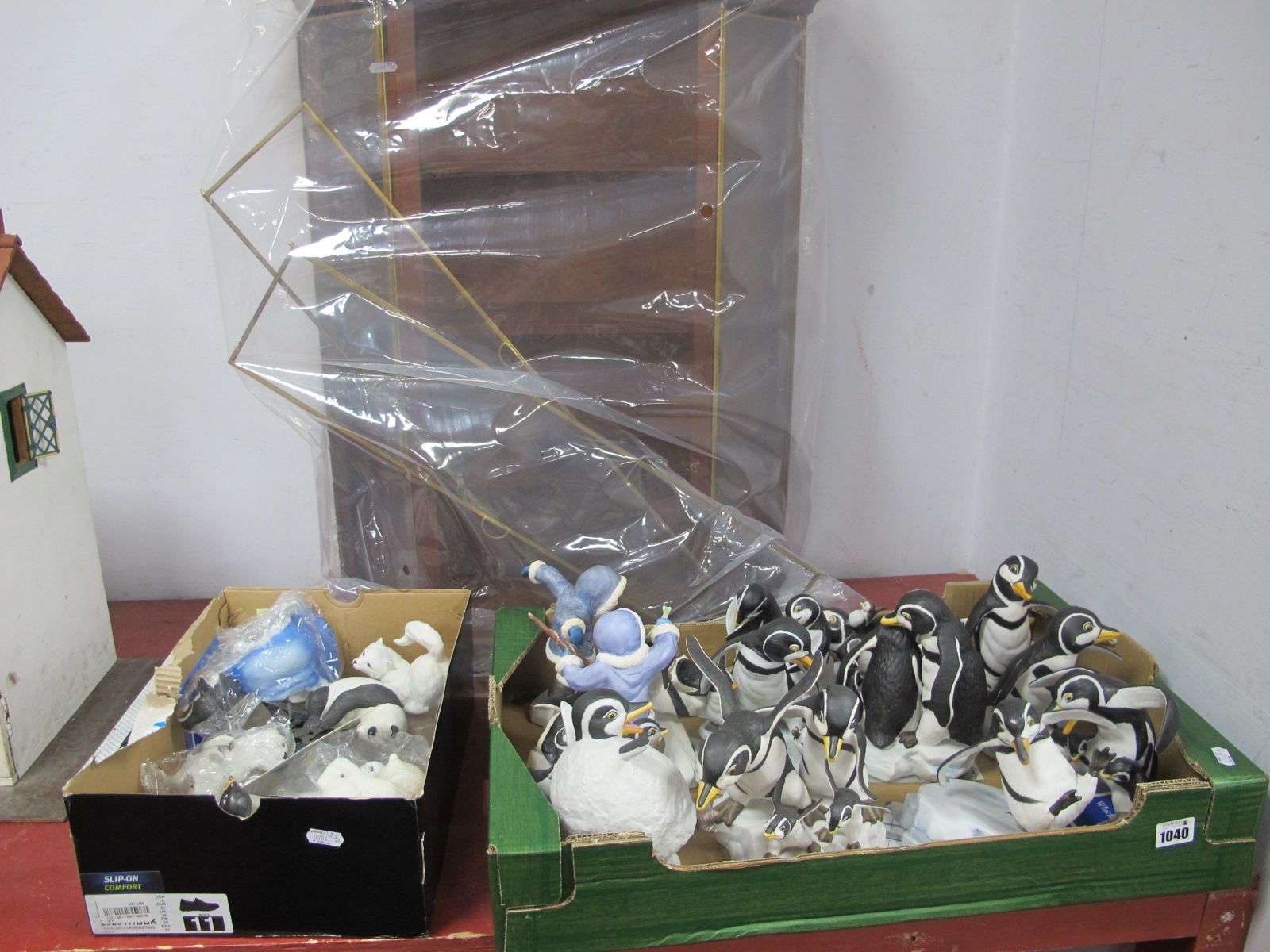 Twelve Franklin Mint Comical Penguin Sculptures, with certificates and six further models similar;