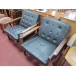 A Pair of Hardwood Framed Easy Chairs, circa 1960's each with black leatherette seat and back, one