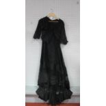 A Victorian Two-Piece Mourning Dress, in black silk, the boned bodice with beaded and sequinned lace