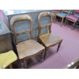 WITHDRAWN A Pair of XIX Century Ash Chairs, with shaped central rail, solid seat, on turned forefron