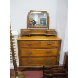 An Early XX Century Dressing Table, with a central mirror, two short and three long, on bracket