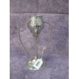 An Art Nouveau Cast Pewter Candlestick, by R.E Williams of Birmingham, having twin loop handles