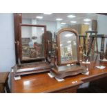 A XIX Century Mahogany Dressing Table Mirror, with shaped supports, plinth base, with one other