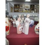 Lladro Lady in Edwardian Dress G-6 JU, 25.4cm high. Lady holding hat F-11A. (2)