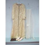 A c.1960's Susan Small Full Length Cream and Gold Thread Gown (used as a wedding dress) with