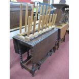 A 1920's Oak Gateleg Table, with pie crust border to canted cornered top, on barley twist