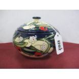 A Moorcroft Pottery Lidded Pot, painted in the Amkerwyke Yew design by Emma Bossons, limited edition