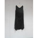 A Circa 1960's Vintage Flapper Style Dress, with dropped waist and side dipped hem, all-over