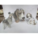 Lladro Beagle Dogs Head,05, 14cm high, two other dogs having butterfly and bird on tail. (3)