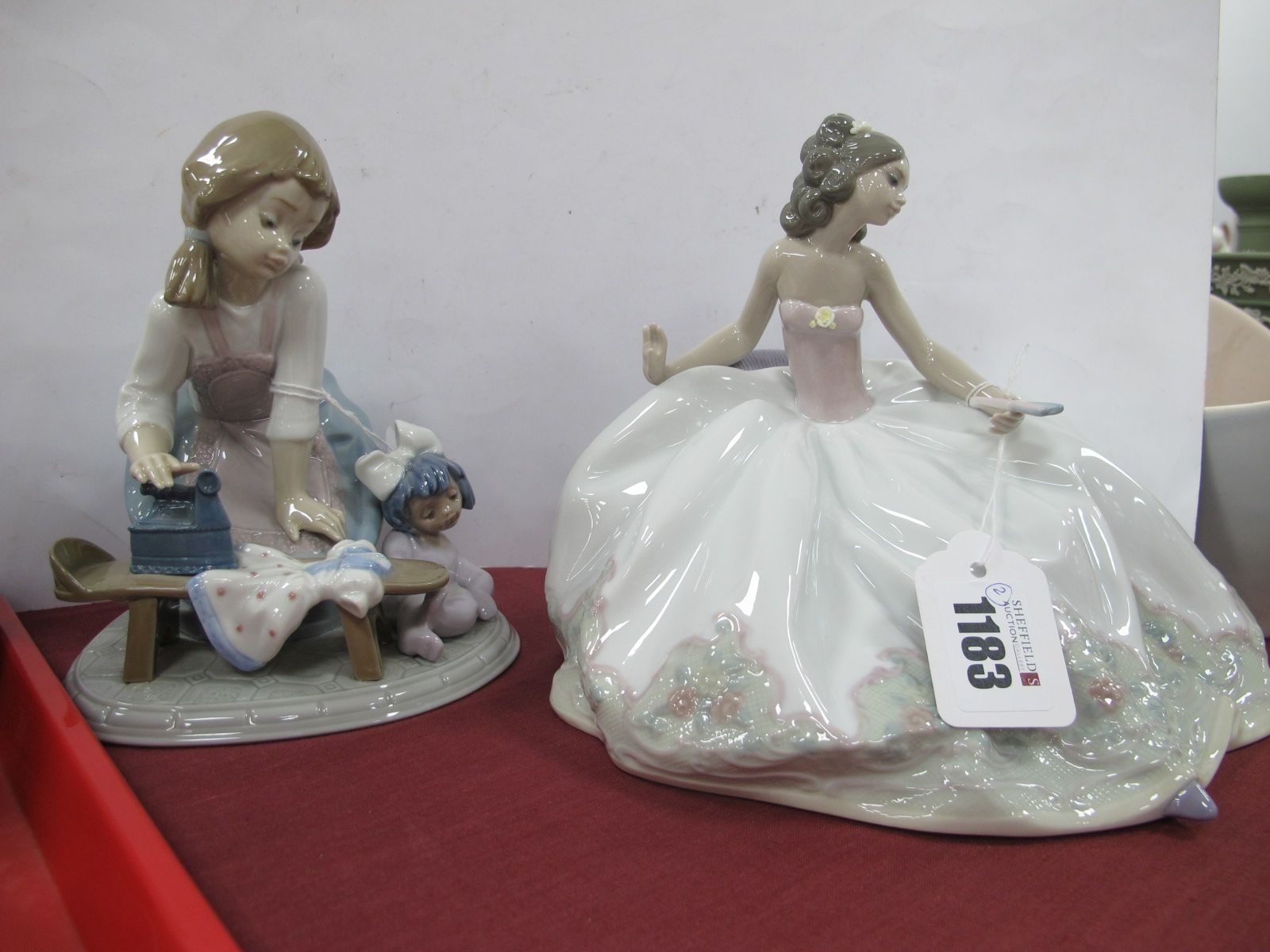 Lladro Going to The Ball Lady, 5859 15cm high, plus girl ironing. (2)