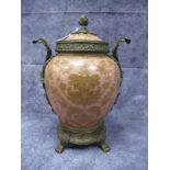A William Lowe Ovoid Pottery Jar, with floral decoration on pink ground, heavy gilt metal rim, shell