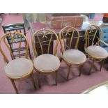 A Set of Four Bentwood Kitchen/Restaurant Chairs - upholstered seats and scrolled back rests.