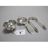 A Hallmarked Silver Tea Strainer, W.A.H., Birmingham 1964, the plain dish on leaf capped pad feet (