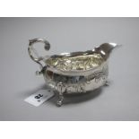 A Hallmarked Silver Sauce Boat, (marks rubbed) possibly London 1746, of compressed oval form with