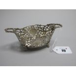 A Hallmarked Silver Twin Handled Basket Dish, MF, London 1904, of oval openwork design, between twin