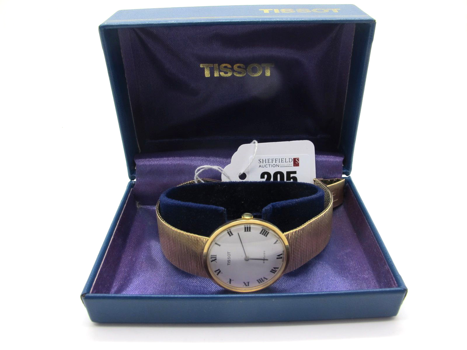 Tissot; A 9ct Gold Cased Gent's Wristwatch, the signed 'Stylist' dial with Roman numerals, the