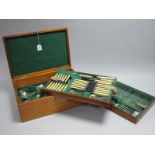 An Oak Cased Campaign Style Twelve Setting Canteen of S.D. Neill Plated Cutlery, c.early XX Century,