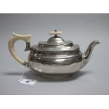 A Hallmarked Silver Tea Pot, EV, Sheffield 1939, of plain rounded rectangular form with shaped ivory