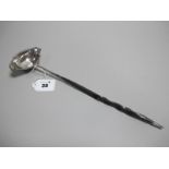 A Toddy Ladle, the oval bowl with twin spouts and inset 1787 George III shilling, with twisted