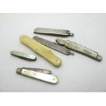 A Thos Turner Pocket Knife, two blades with silver scales, 8.5cm closed length; A Comb, in a